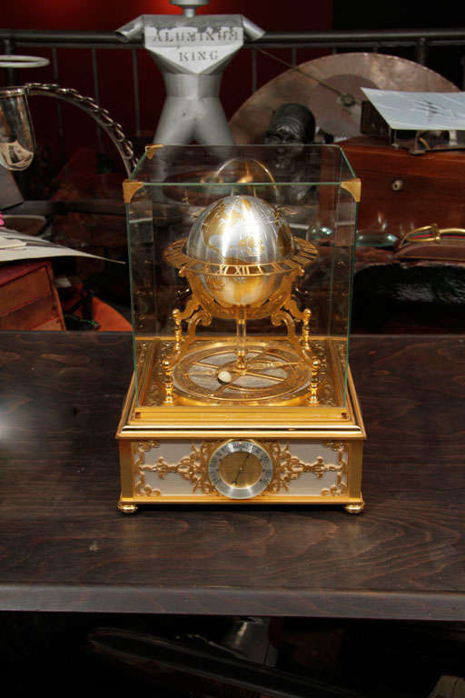 The luxury clock company Hour Lavigne produced clocks for Cartier, Hermes, and Tiffany in its day. This is their interpretation of a 19th century French globe clock.